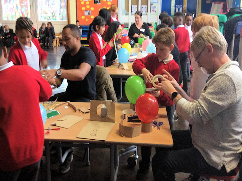 Parents and children doing crafts together